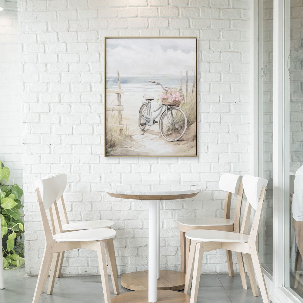 objet décoratif vélo fleuri à la plage